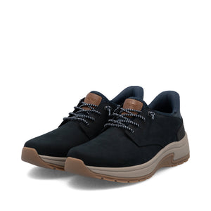 Pair of navy blue sneakers with brown soles on a white background