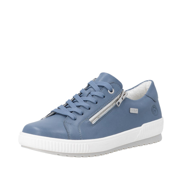 Blue sneaker with white sole on a white background