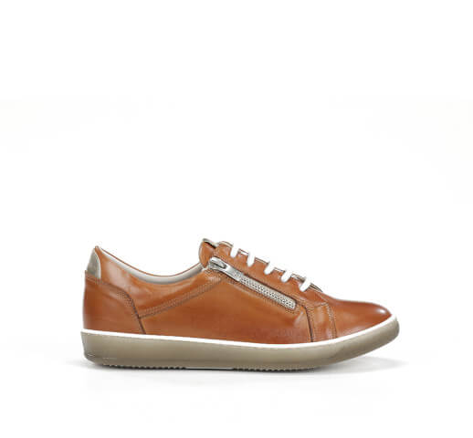 Brown leather sneaker with a silver zipper on a white background