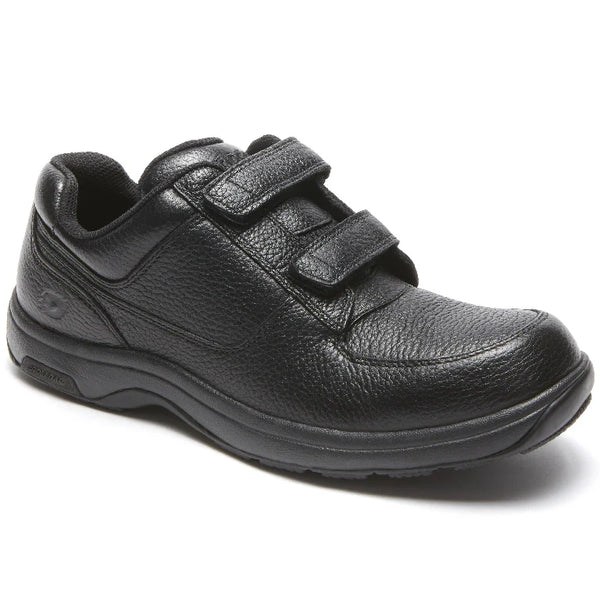 Black shoe with velcro straps on a white background