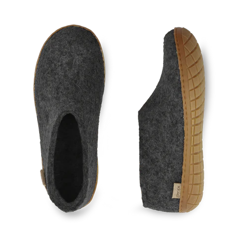 Gray felted slippers with brown soles on a white background